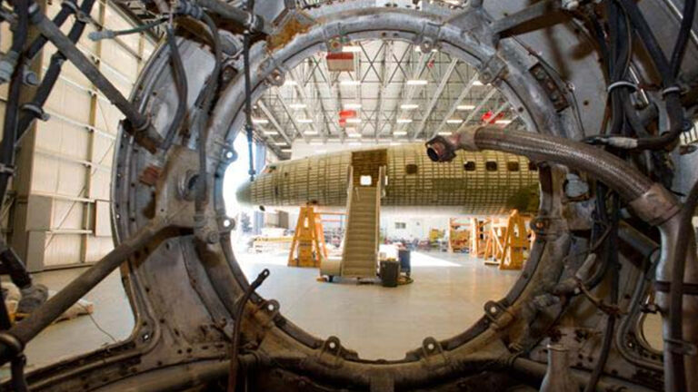 View of restored airplane from inside circular part. 